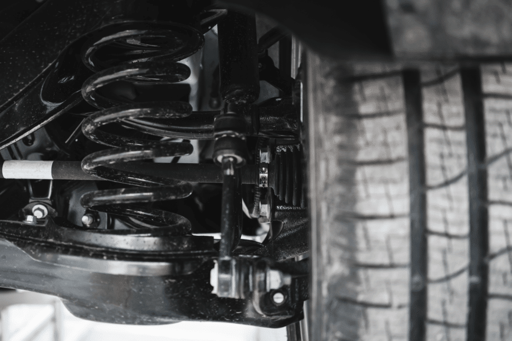 steering or suspension, steering and suspension repair in North Little Rock, AR by Cantrell Service Center. Image of a vehicle’s suspension system and tire, showcasing the shop’s dedication to ride comfort, handling, and safety through precise suspension maintenance.